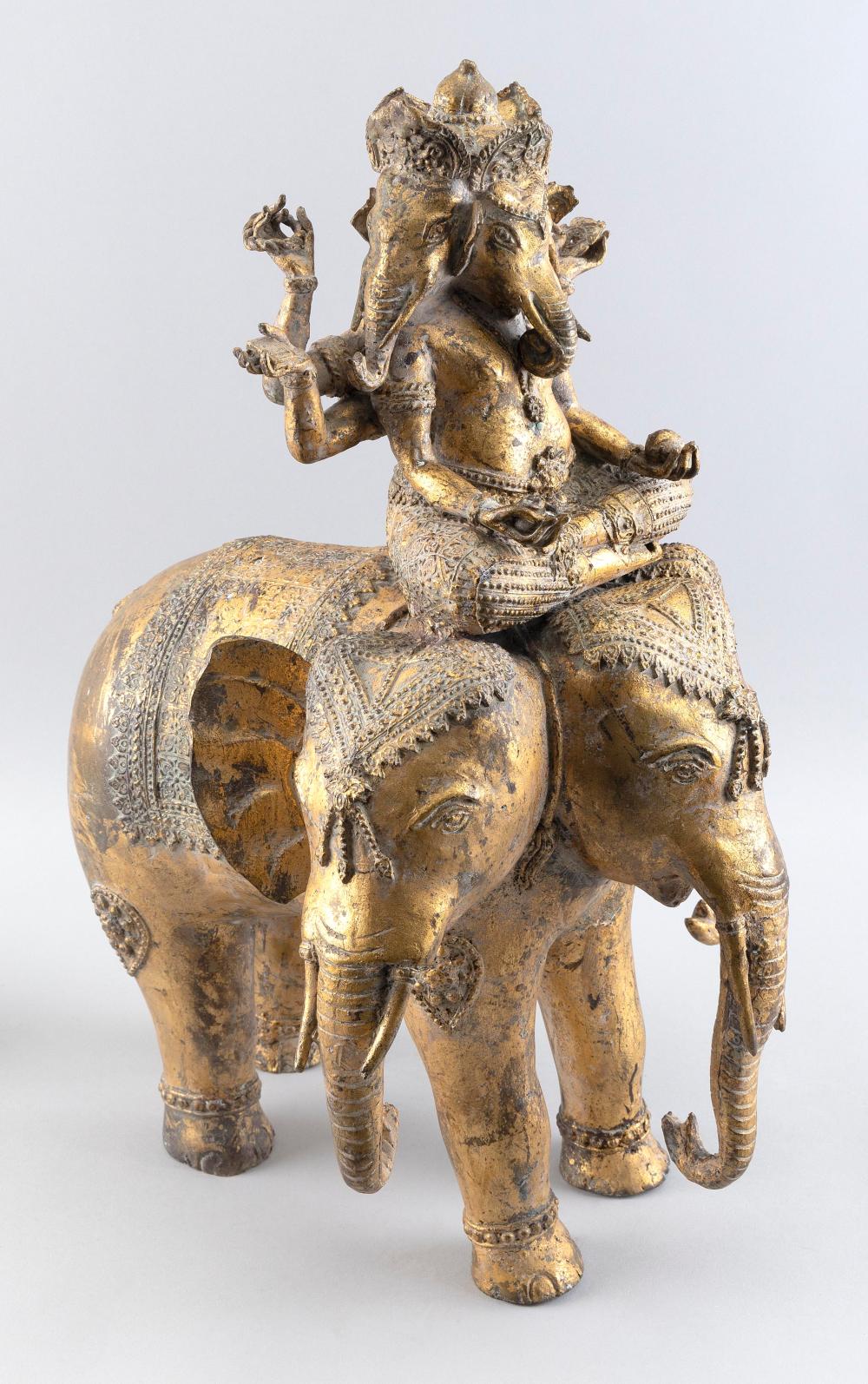 Appraisal: NEPALESE GILT-BRONZE FIGURE OF GANESHA RIDING AN ELEPHANT TH CENTURY