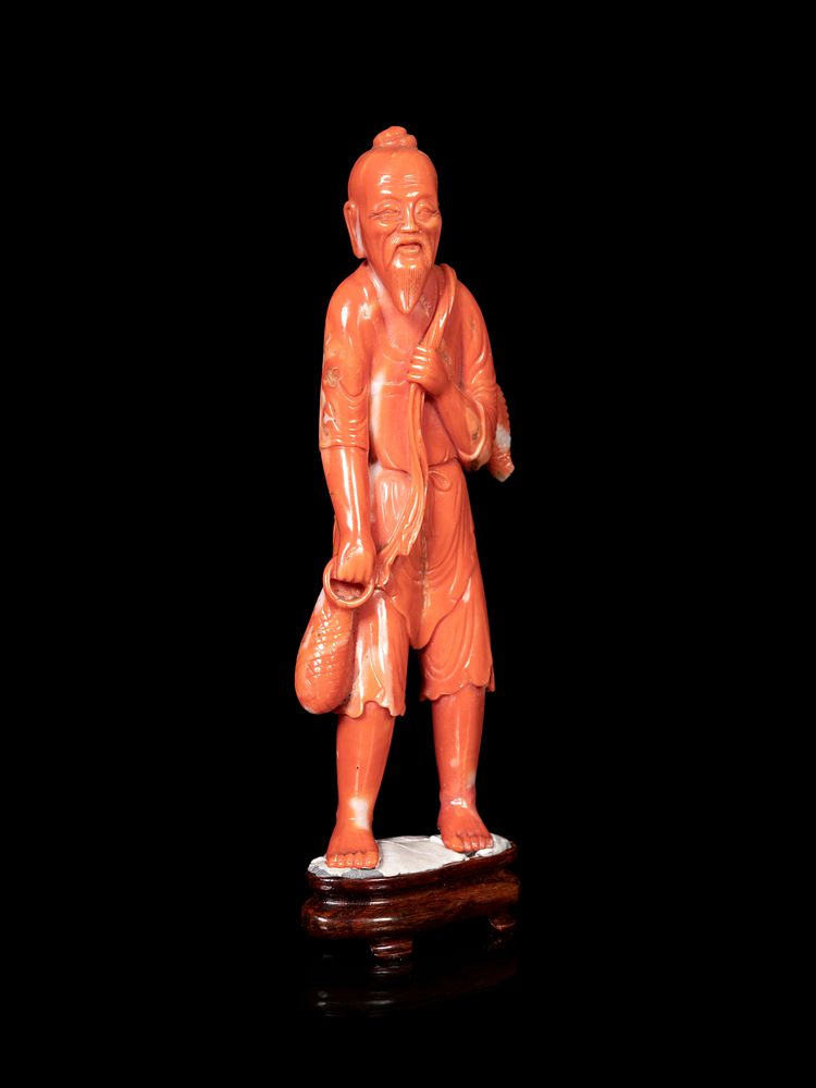 Appraisal: A Chinese Red Coral Figure of a Fisherman A Chinese