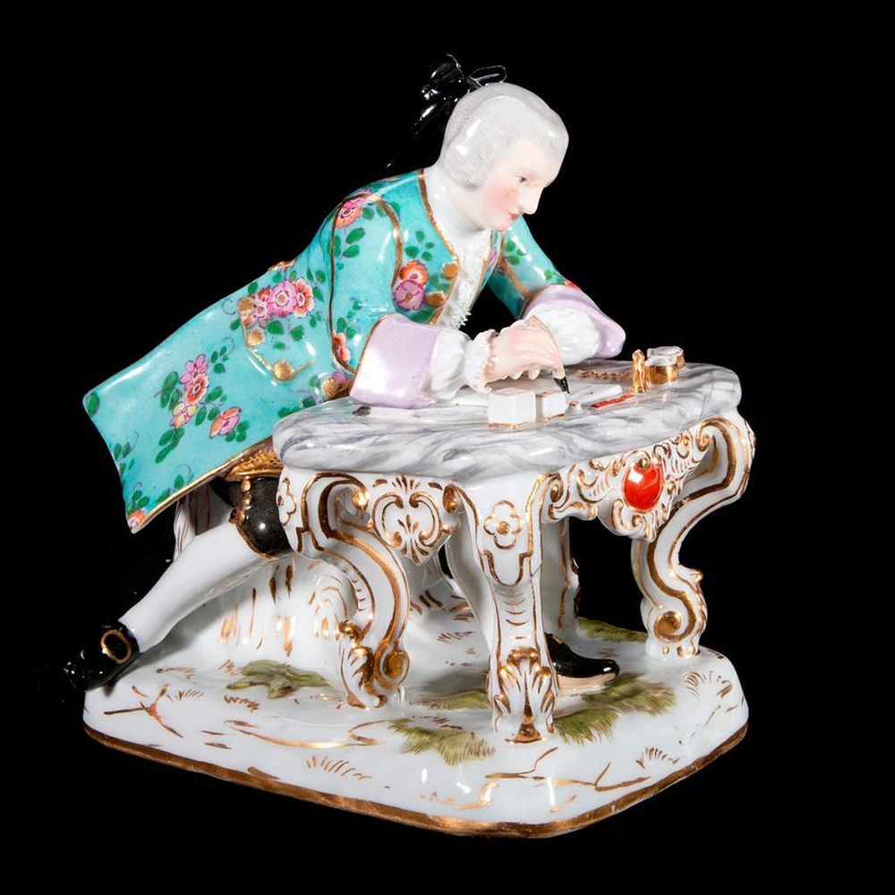 Appraisal: A Meissen figure A Meissen figure at his desk H