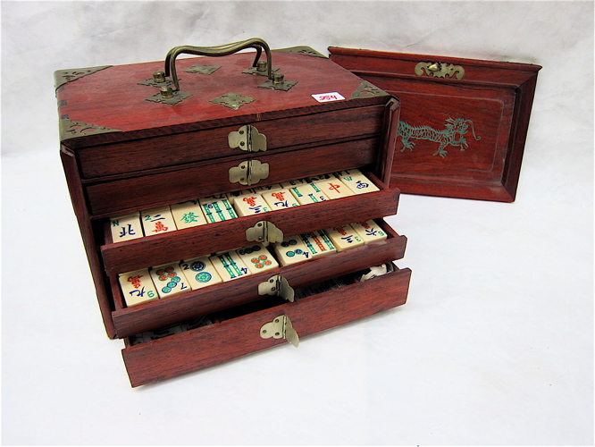 Appraisal: CHINESE MAHJONG SET wooden box with brass handles and fittings