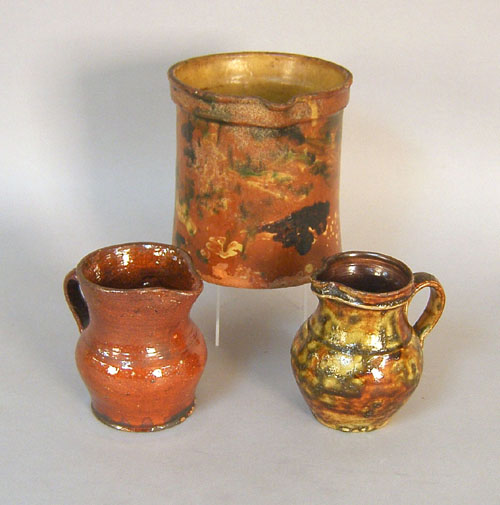 Appraisal: Three redware pitchers th c