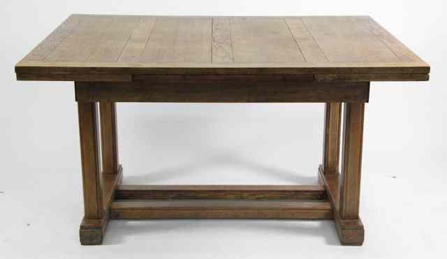 Appraisal: An oak draw leaf table the square section legs united