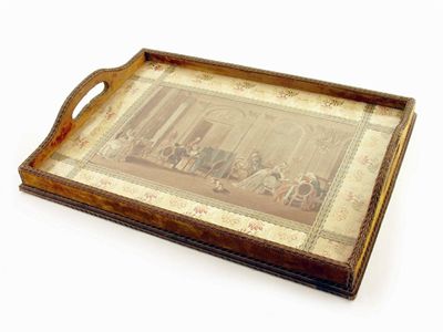 Appraisal: A French fabric covered rectangular tray inset an engraving of