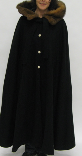 Appraisal: LADY'S BLACK WOOL CAPE with mink collar reach-through side pockets