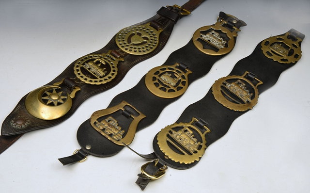 Appraisal: A COLLECTION OF NINE RAILWAY THEMED HORSE BRASSES on three