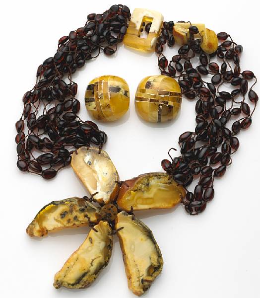 Appraisal: A set of amber and silver jewelry comprising a necklace