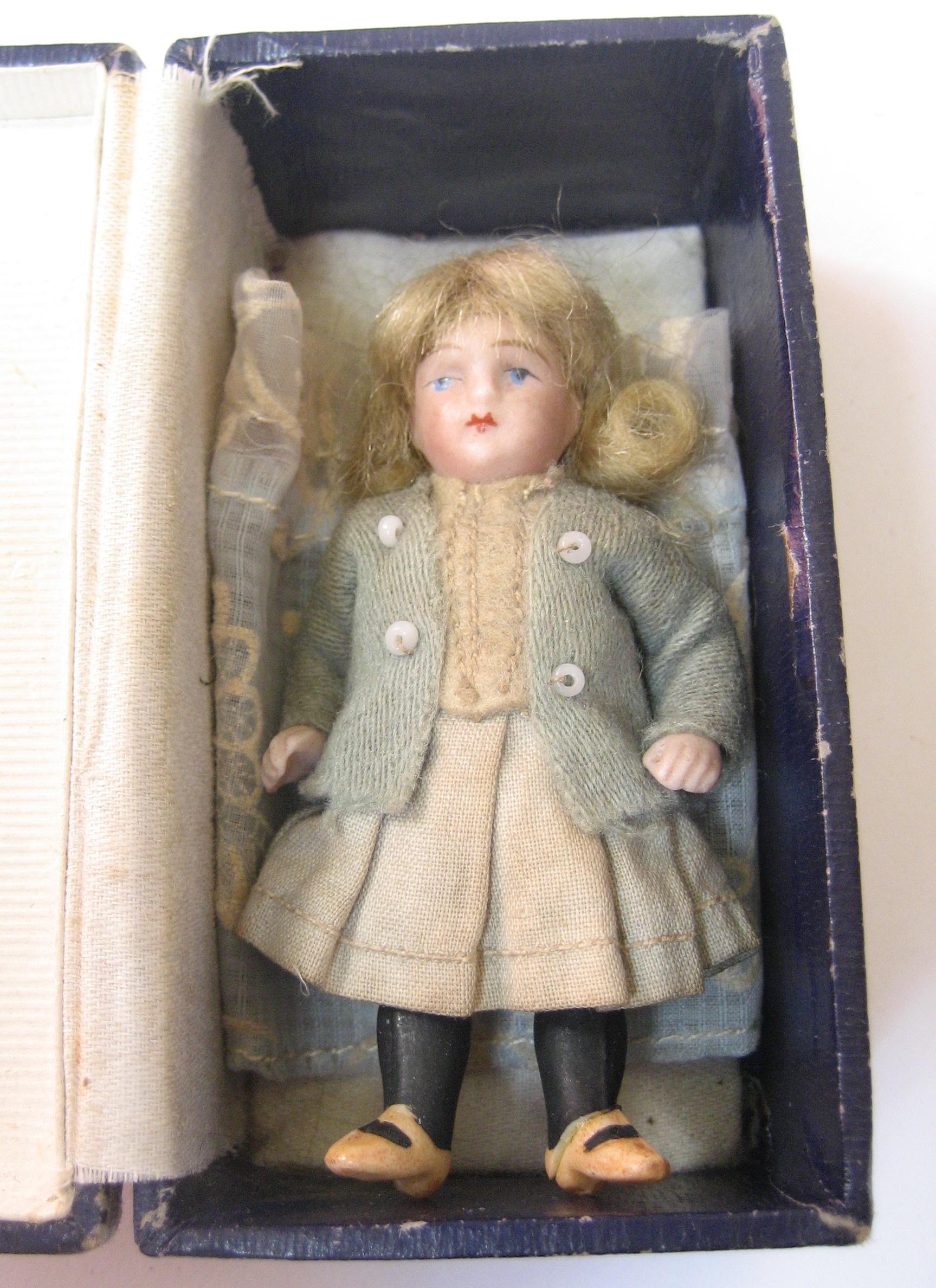 Appraisal: An all bisque doll's house doll with painted face blonde