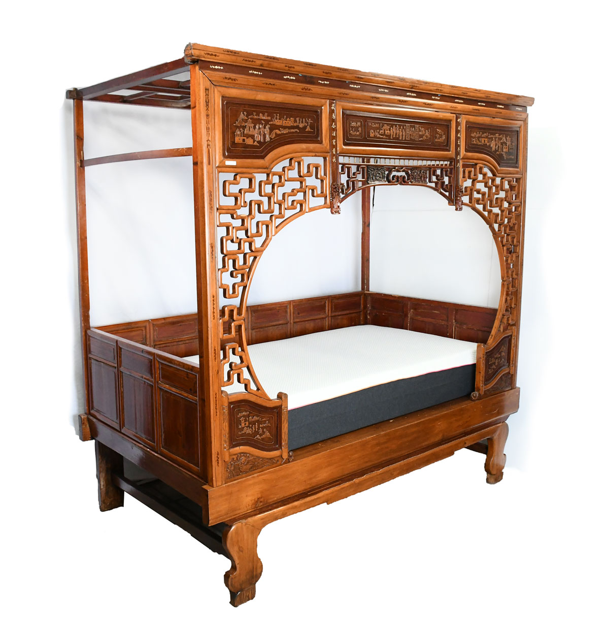 Appraisal: CARVED INLAID CHINESE WEDDING BED Open fretwork panel canopy having