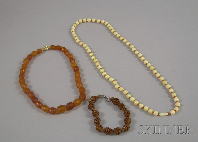 Appraisal: Amber and Bone Necklaces and a Wooden Bracelet amber necklace