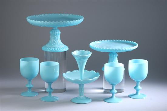 Appraisal: ELEVEN PIECES BLUE OPALINE GLASSWARE Including eight goblets two compotes