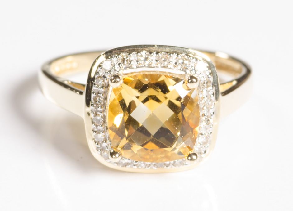 Appraisal: CITRINE DIAMOND AND FOURTEEN KARAT GOLD RING with round-cut diamonds