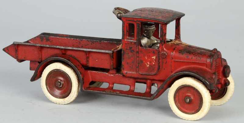 Appraisal: Cast Iron Arcade Red Baby Truck Toy Description American International