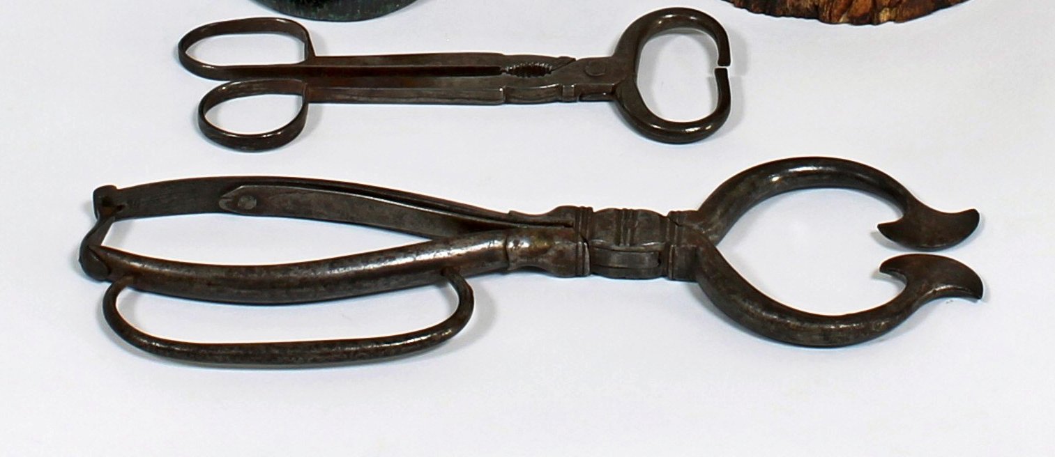 Appraisal: A pair of iron sugar nips and a rare nutcracker