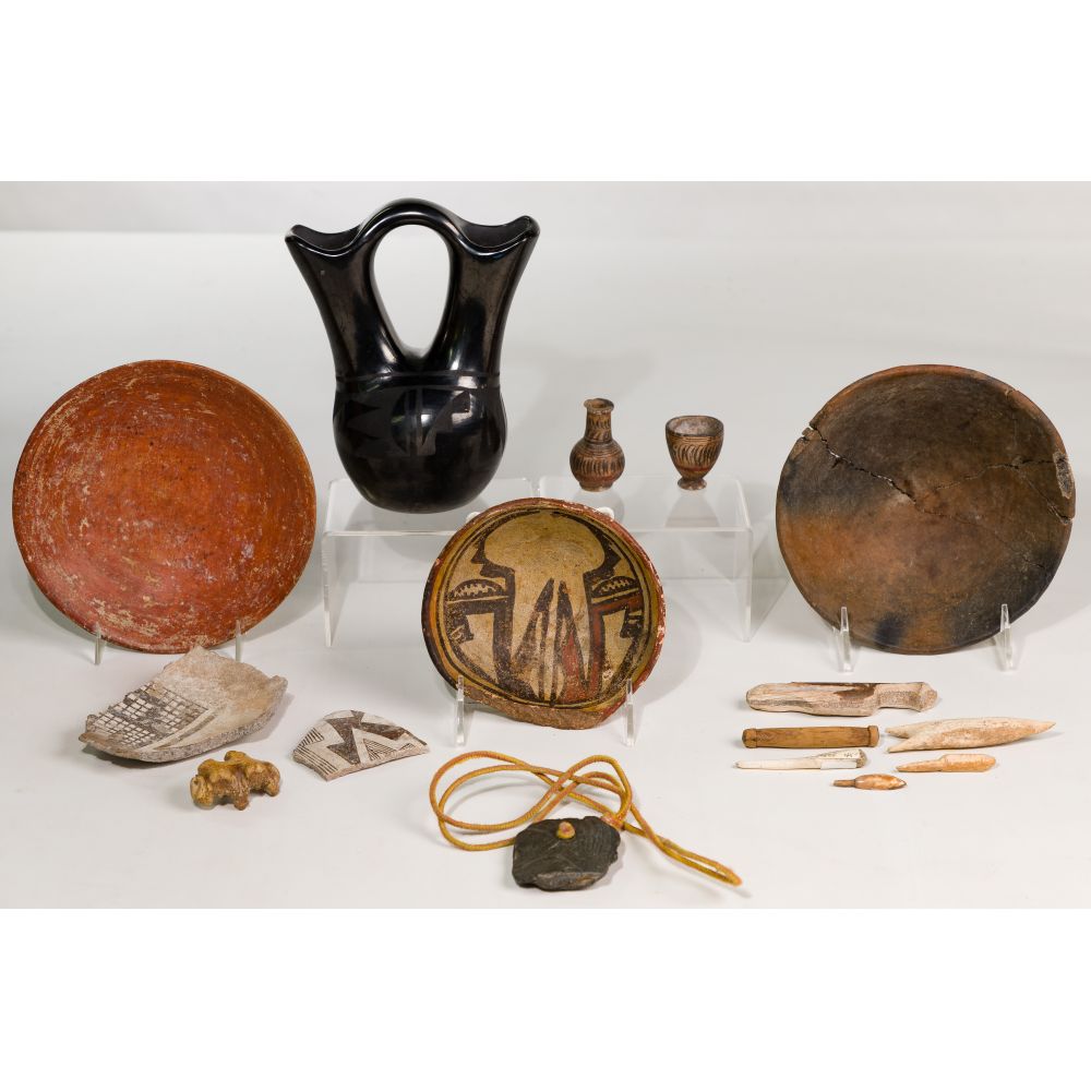 Appraisal: SOUTHWESTERN PUEBLO POTTERY ASSORTMENT items including a blackware wedding cup