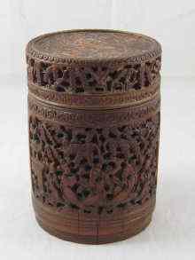 Appraisal: A large bamboo pot and cover deeply and intricately carved