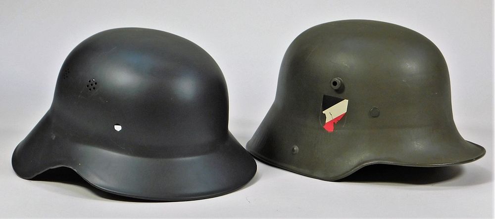 Appraisal: Two Repainted German Helmets Germany A size Model shell with