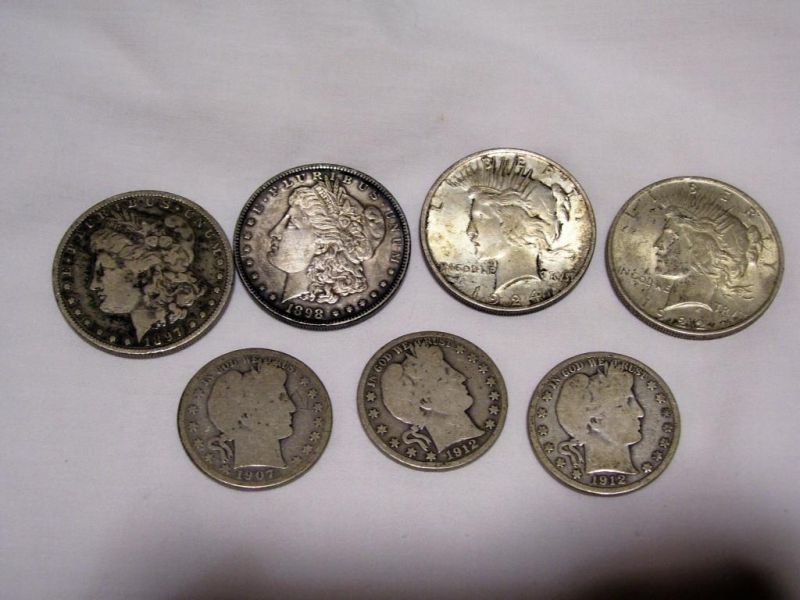 Appraisal: Silver Dollars and Half Dollars Includes - Peace Dollars -