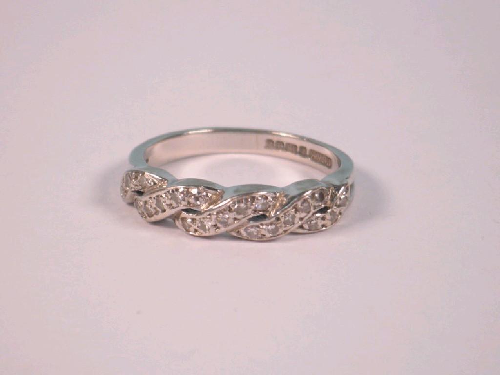 Appraisal: A diamond set dress ring of twists set with tiny