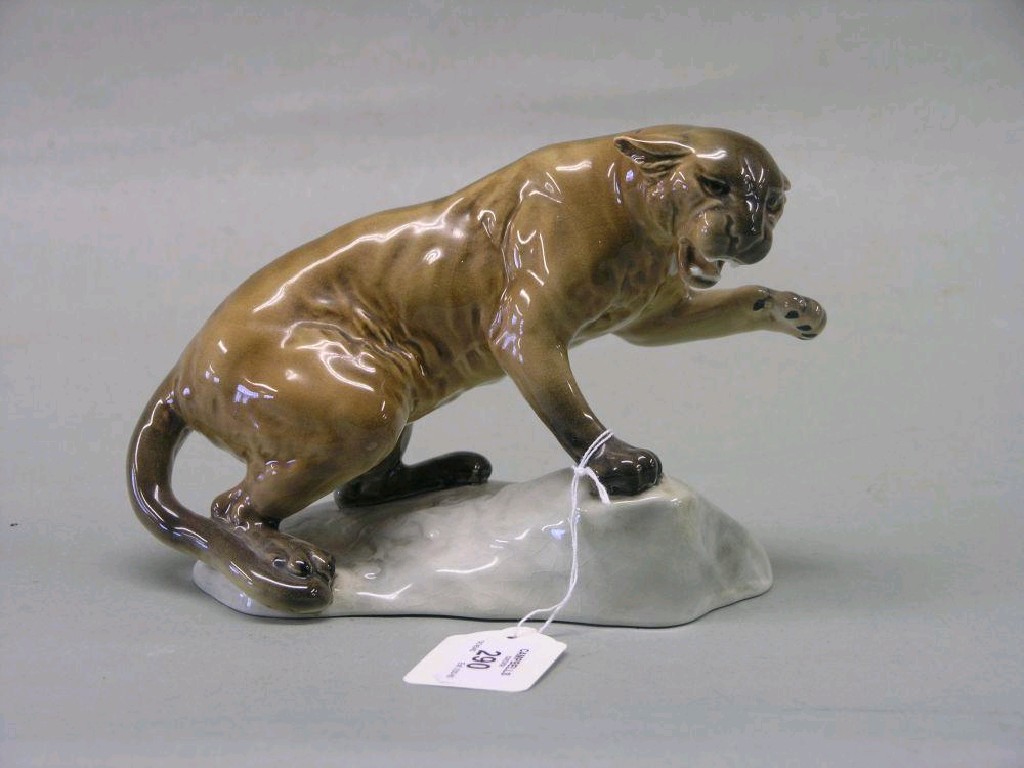 Appraisal: A Beswick Puma on Rock shape tawny