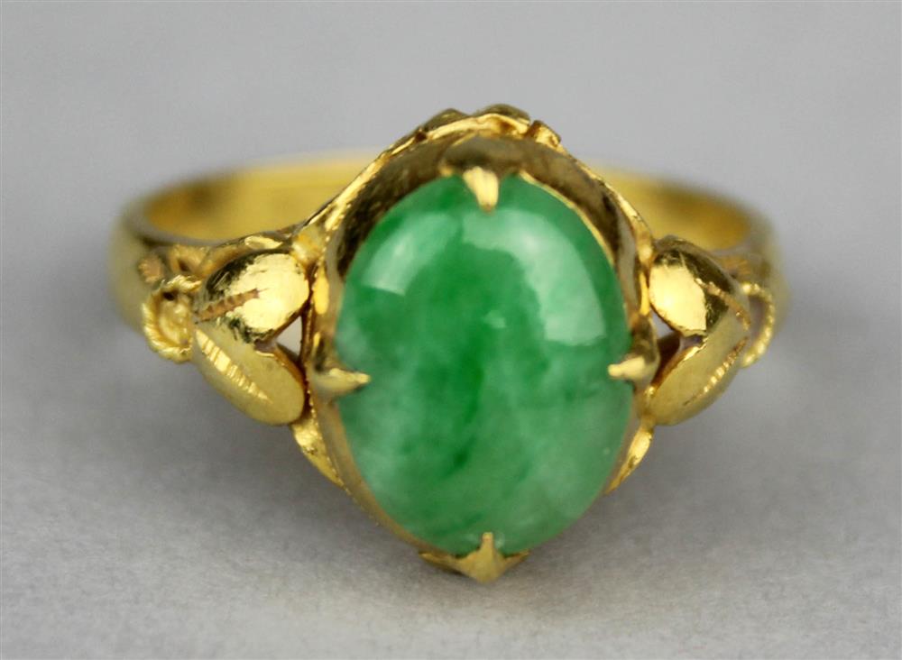 Appraisal: CHINESE K YELLOW GOLD RING WITH JADEITE CABOCHON the ring