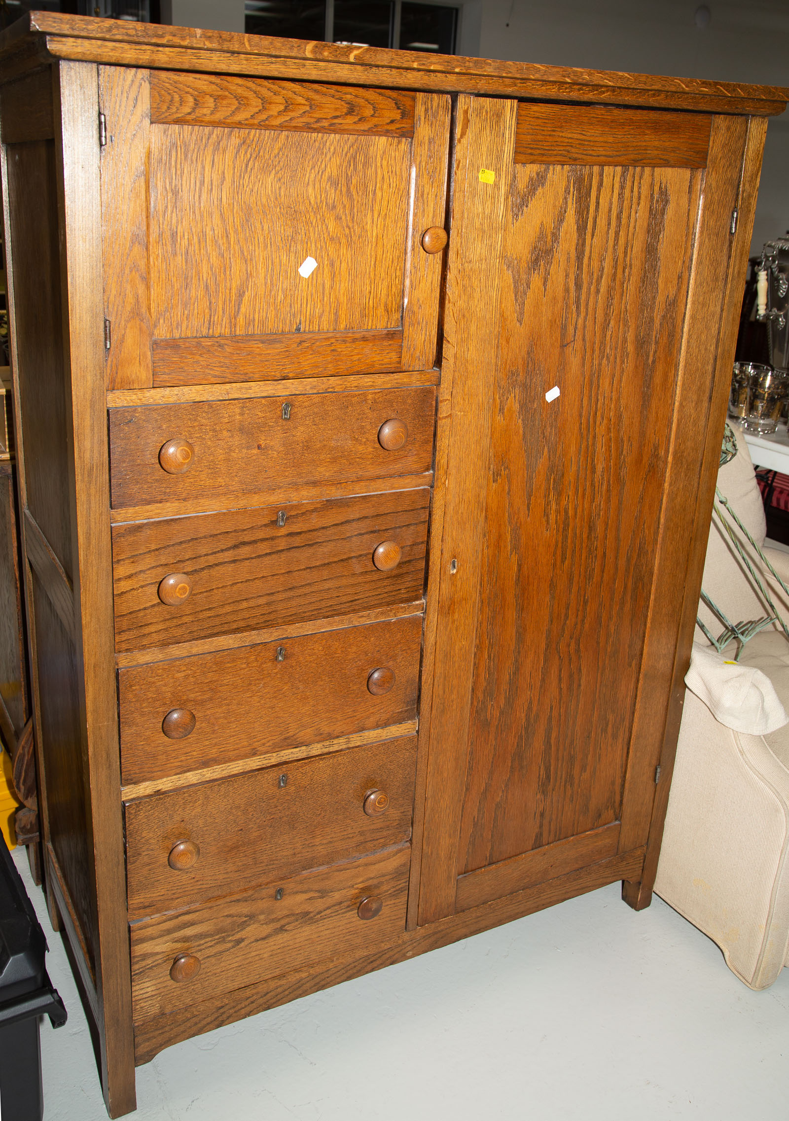 Appraisal: AMERICAN MISSION STYLE OAK CHIFFOROBE Circa with a hat cabinet