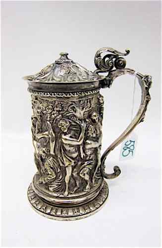 Appraisal: SILVERPLATED TANKARD relief decoration with hinged lid Height '' The