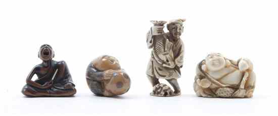 Appraisal: A Group of Four Netuske comprising a boxwood carved howling