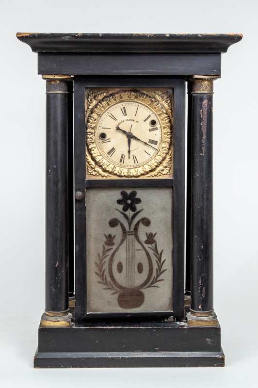 Appraisal: AMERICAN GILT-METAL-MOUNTED EBONIZED WOOD PILLAR CLOCK BOSTON CLOCK CO With