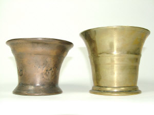 Appraisal: An eighteenth century bronze mortar with moulded body bands height