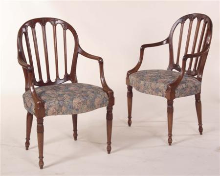 Appraisal: A pair of Hepplewhite style mahogany open arm chairs each