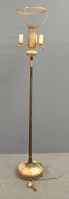 Appraisal: - Standing floor lamp with a marble and brass base