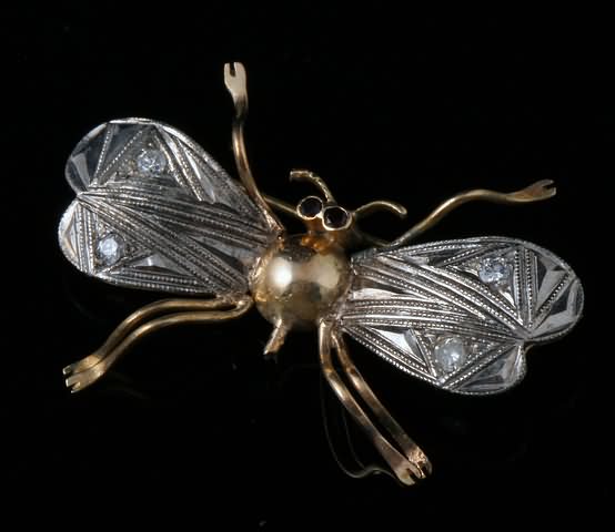 Appraisal: KTT X Bee Pin with diamonds accenting wings Approx ctw