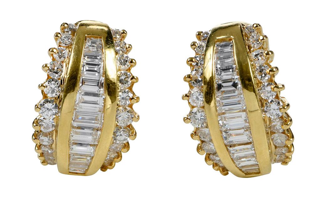 Appraisal: kt Diamond Earrings each with round brilliant and baguette cut