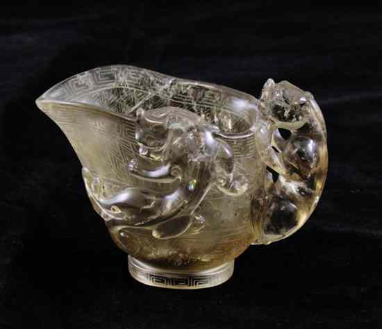 Appraisal: A Chinese rock crystal pouring vessel Yi with lion dog