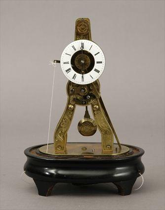 Appraisal: Brass Skeleton Clock with Ebonized Base x in