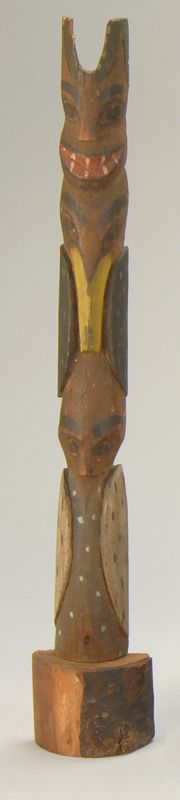 Appraisal: MINIATURE NORTHWEST TOTEM POLE Late th CenturyWith three figures Paint