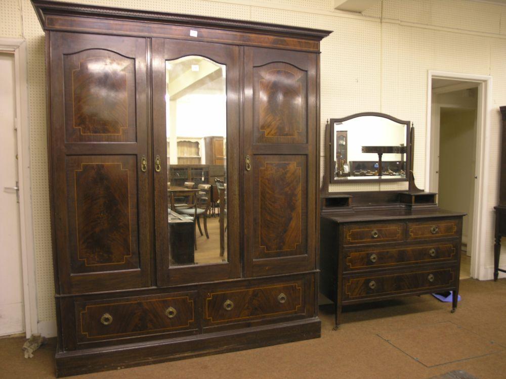 Appraisal: An Edwardian inlaid mahogany bedroom pair comprising large lady's wardrobe