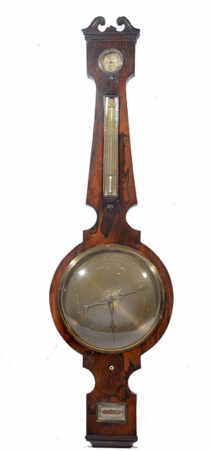 Appraisal: A GEORGE IV ROSEWOOD WHEEL BAROMETER having a dial beneath