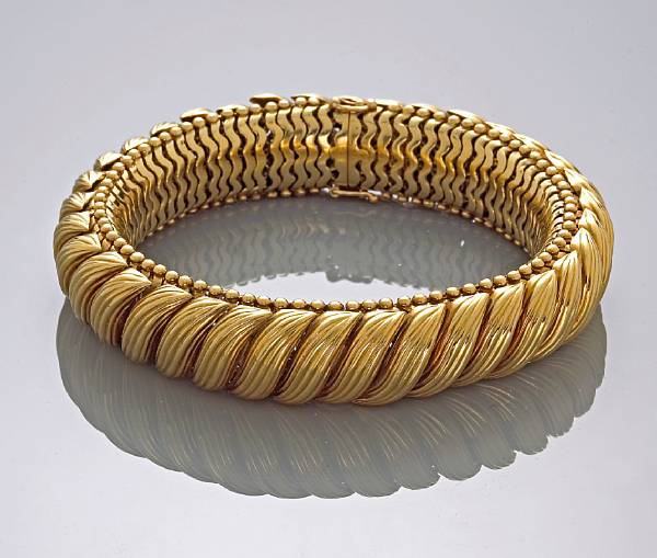 Appraisal: An eighteen karat gold flexible bracelet weighing approximately grams length