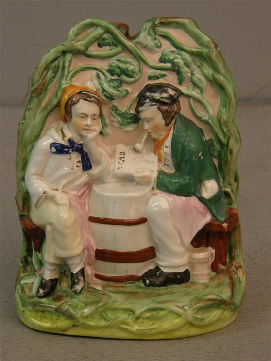 Appraisal: Staffordshire figural group of two figures seated by a barrel