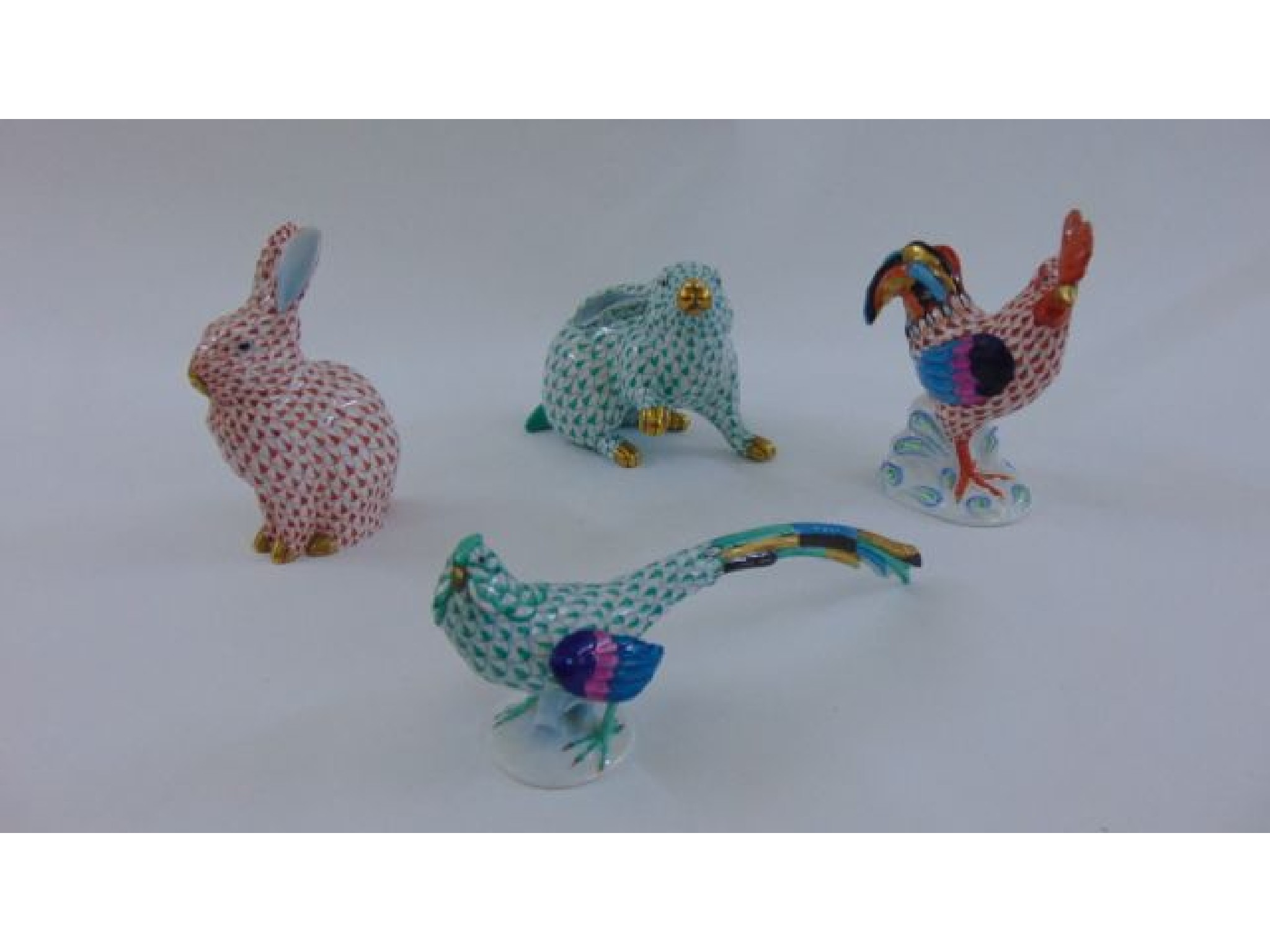 Appraisal: Four Herend hand painted animals including cockerel two hares and