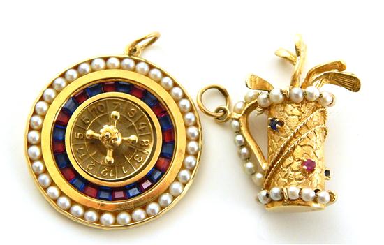 Appraisal: JEWELRY two charms miniature roulette wheel charm K yellow gold