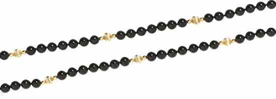 Appraisal: A Single Strand Onyx and Gold Bead Necklace containing onyx