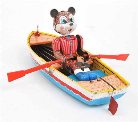 Appraisal: SUZUKI AND EDWARDS CO TINPLATE BEAR ROWER colourful lithographed bear