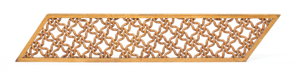 Appraisal: UNUSUAL AMERICAN FRETWORK PANEL Late th century butternut Parallelogram-shape with