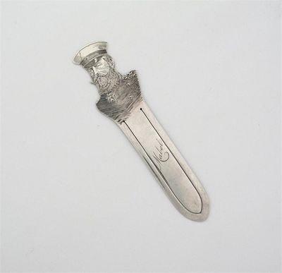 Appraisal: A Victorian bookmark the terminal cut out and engraved with