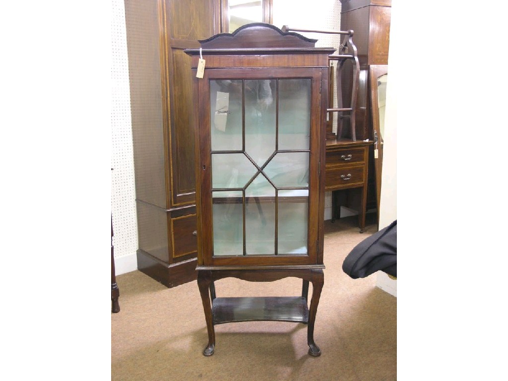 Appraisal: A small early th century mahogany display cabinet lined interior