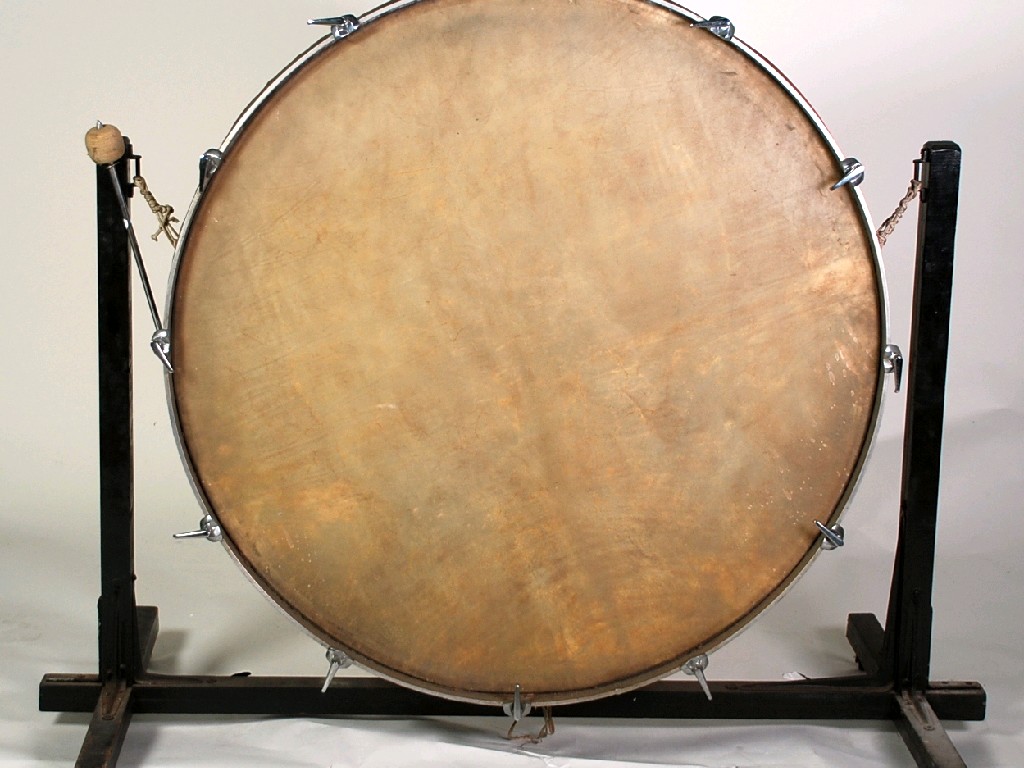 Appraisal: VERY LARGE BASS DRUM ON STAND the ebonised wood frame