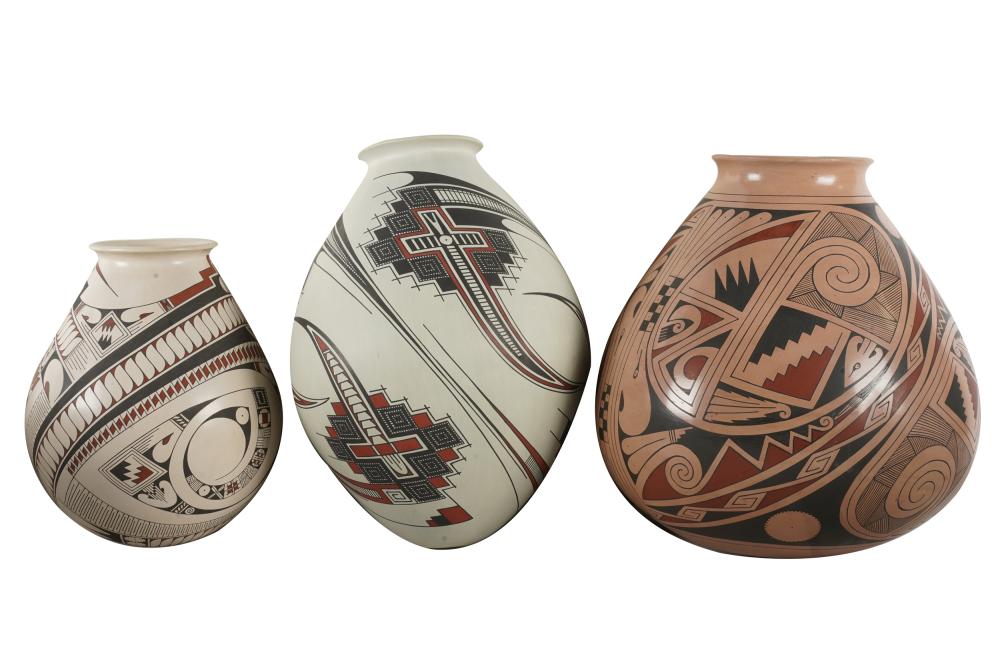 Appraisal: THREE NATIVE AMERICAN POTTERY VESSELScomprising two Jorge Quintana inches high