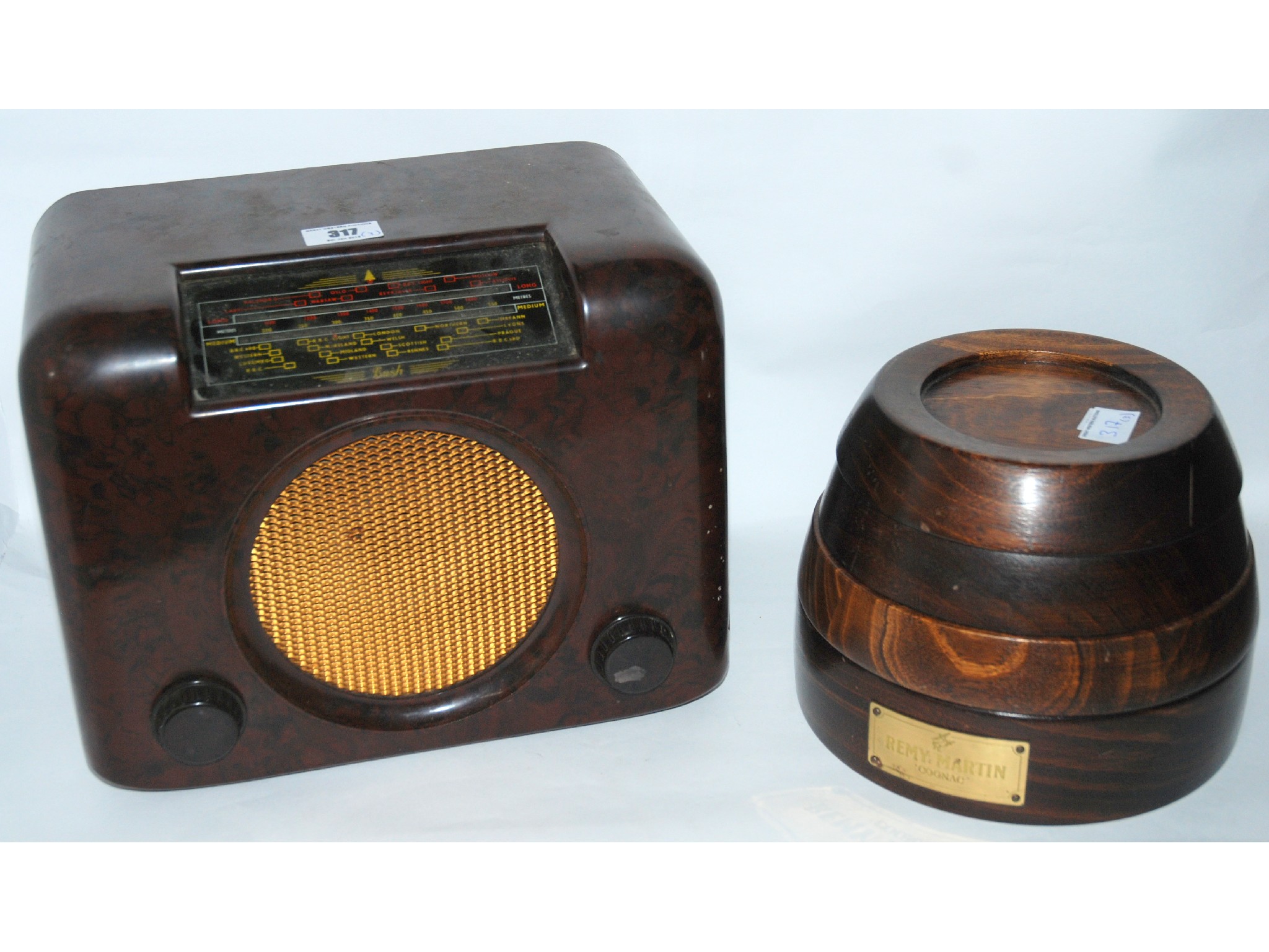 Appraisal: A Bakelite Bush radio and two Remy Martin stackable games